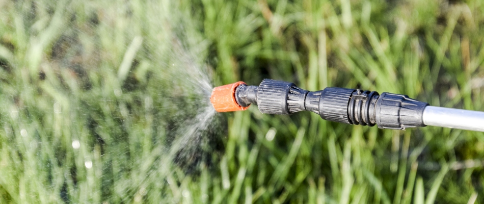 Liquid fertilizer being sprayed on a lawn in North Mankato, MN.